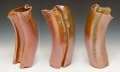 Ceramic vase vessel with copper accents; size 14"; stoneware clay; wood-fired with shino glaze